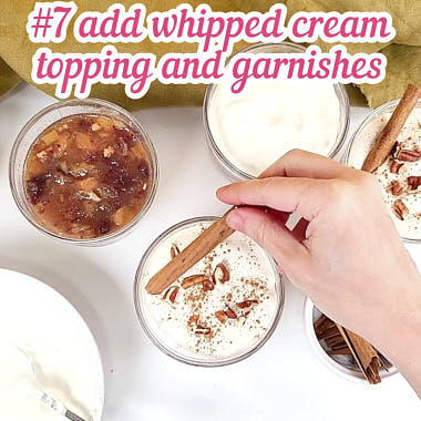 Adding whipped topping and decorating with cinnamon and pecans.