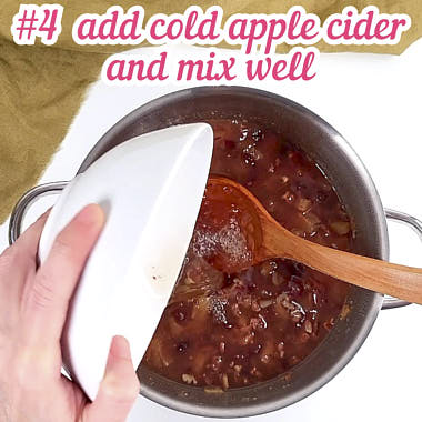 Adding cold apple cider.