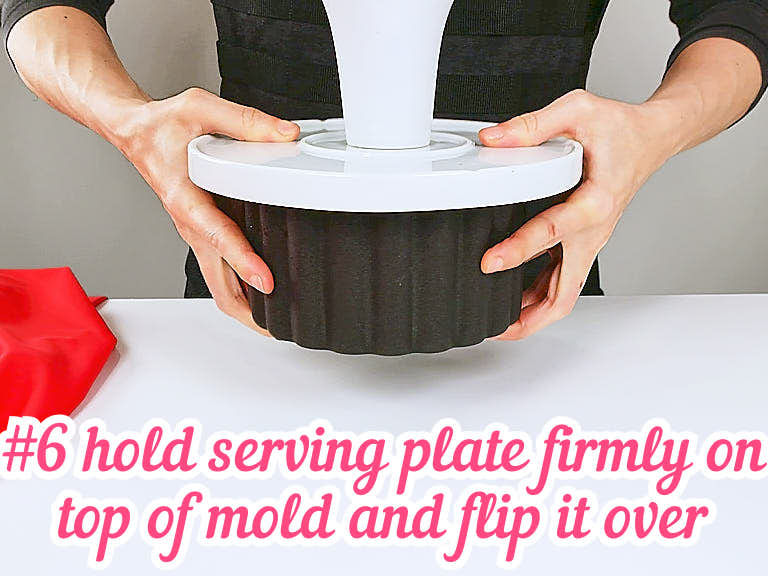 Flipping mold onto serving plate.
