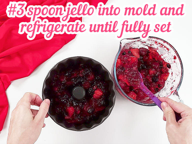 Spooning soft set jello into mold.