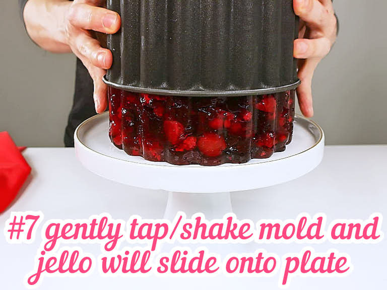 Jello sliding off the mold onto plate.