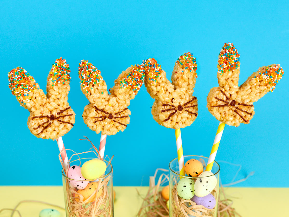Rice krispie treats on sticks with Easter eggs.