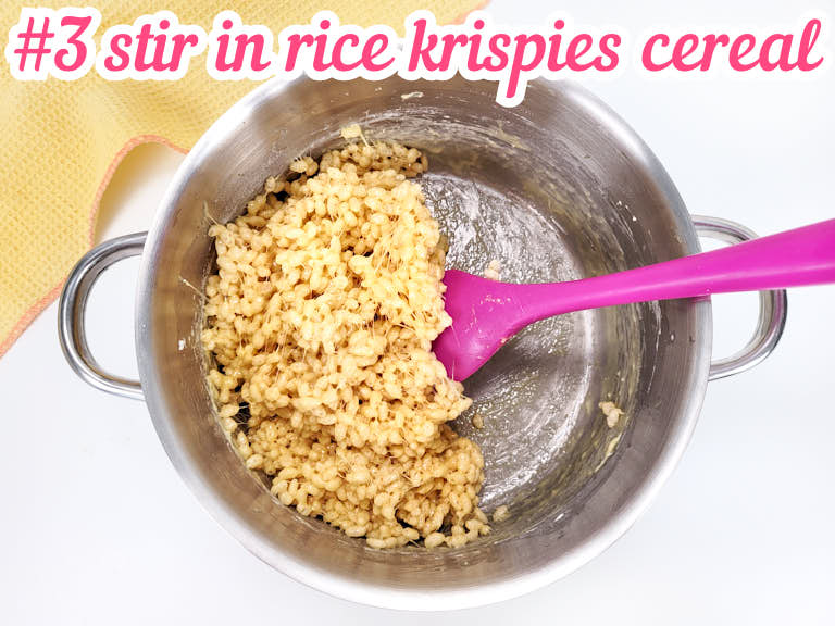 Adding rice krispies cereal and stirring until fully coated.