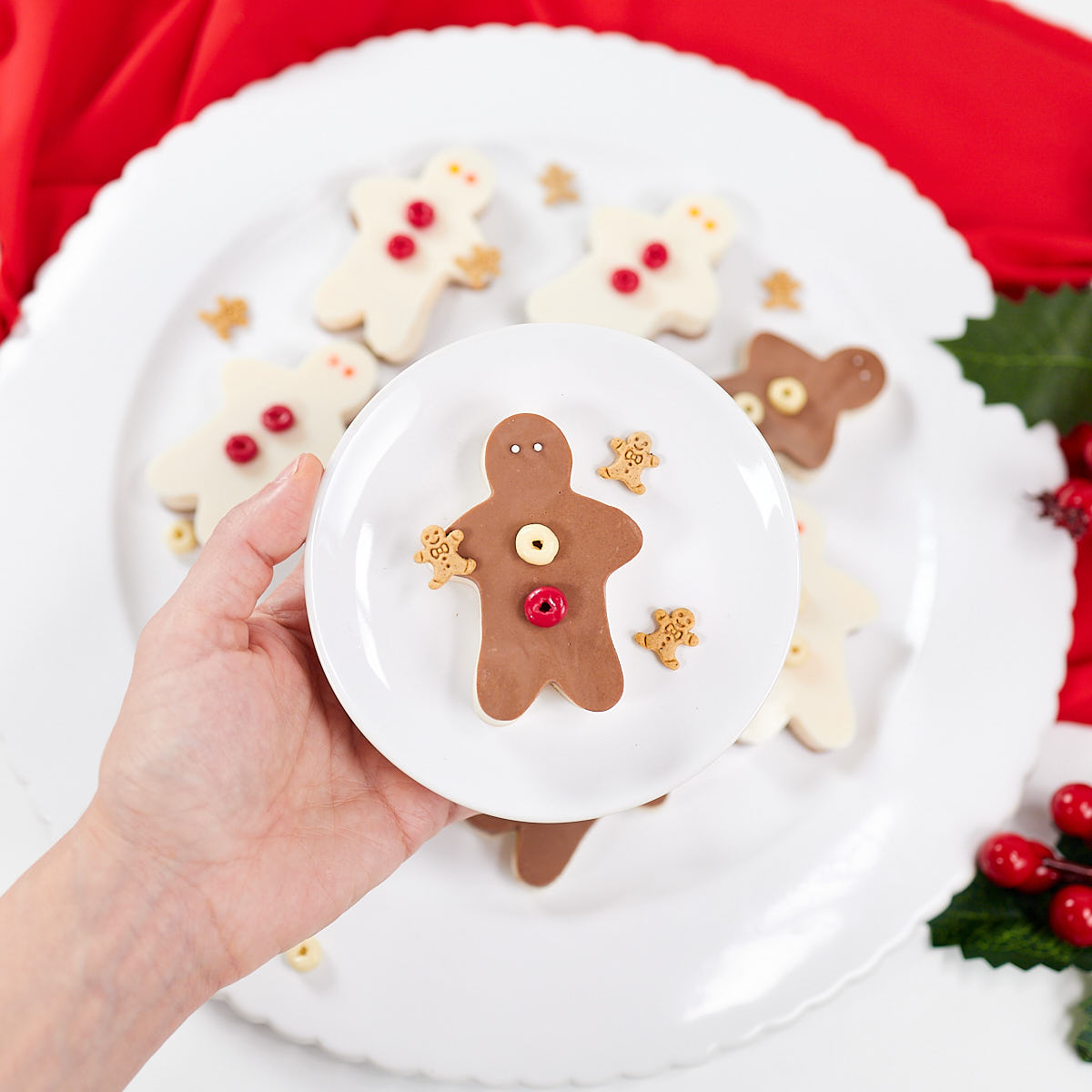 Gingerbread cookie jello jigglers with sprinkles on a small plate.