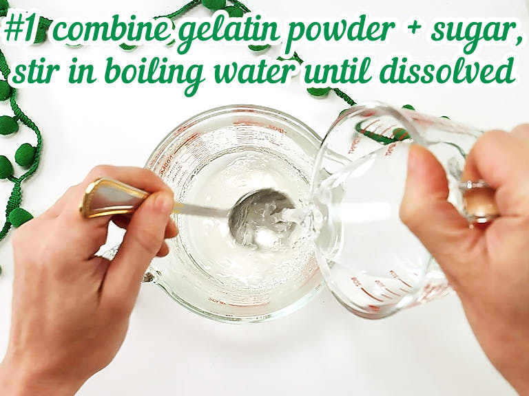 Mixing gelatin powder and sugar with boiling water.