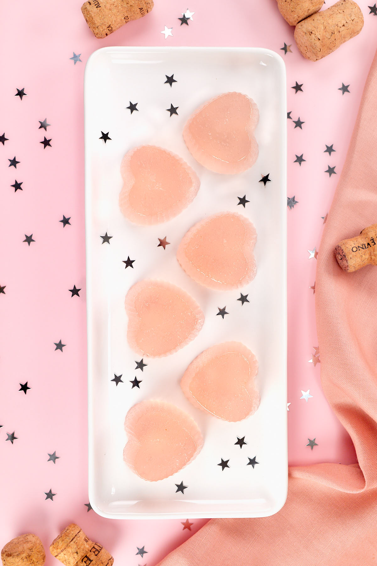 Sparkling Valentine's jello shots with Pink Champagne and gin bramble.