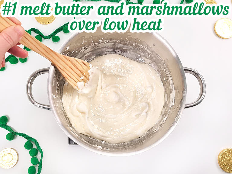 Melting butter and marshmallows mixing over low heat.