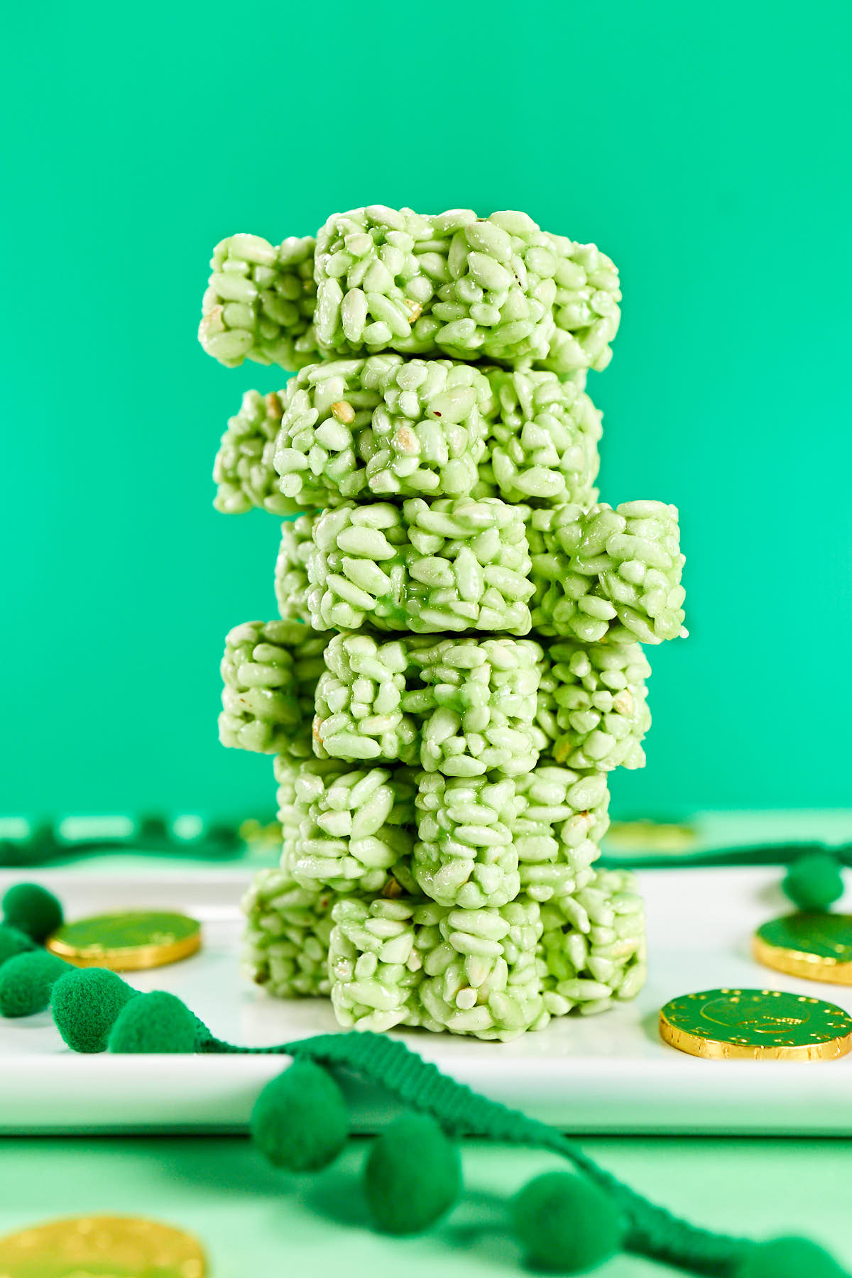 Stacked up green rice krispies treats.