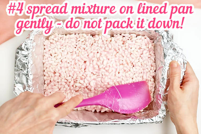 Gently spreading mixture on lined pan.